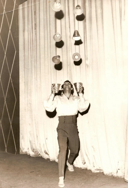 Archival photograph of Freddy Kenton performing with shaker cups